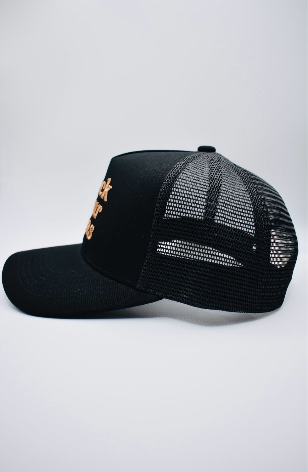 Buck Your Ideas Black / Tan Trucker Cap