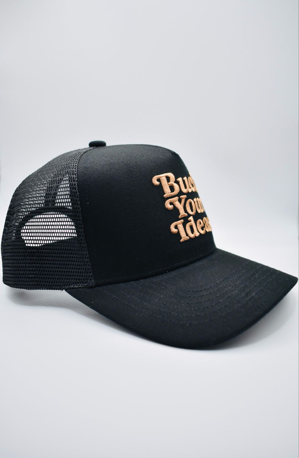 Buck Your Ideas Black / Tan Trucker Cap