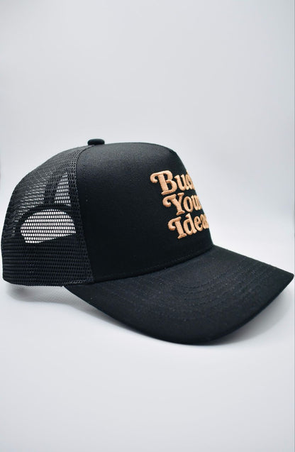 Buck Your Ideas Black / Tan Trucker Cap